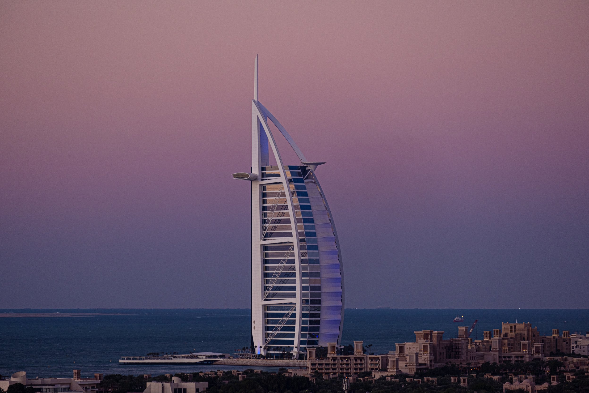 Burj Al Arab skyscraper at sunset